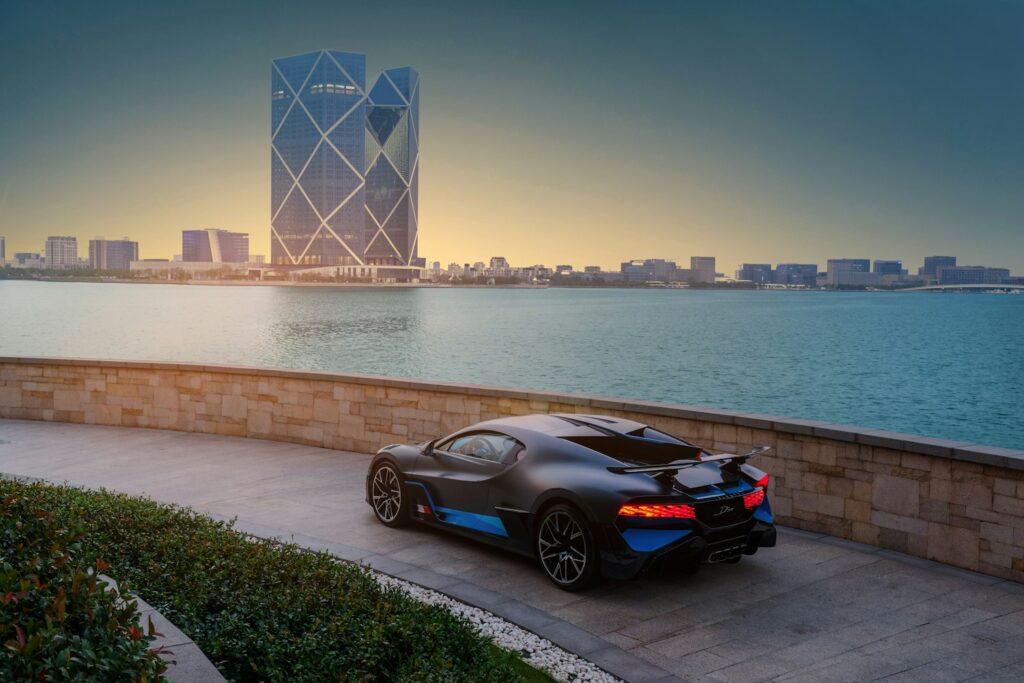 Shanghai skyline at night with Bugatti